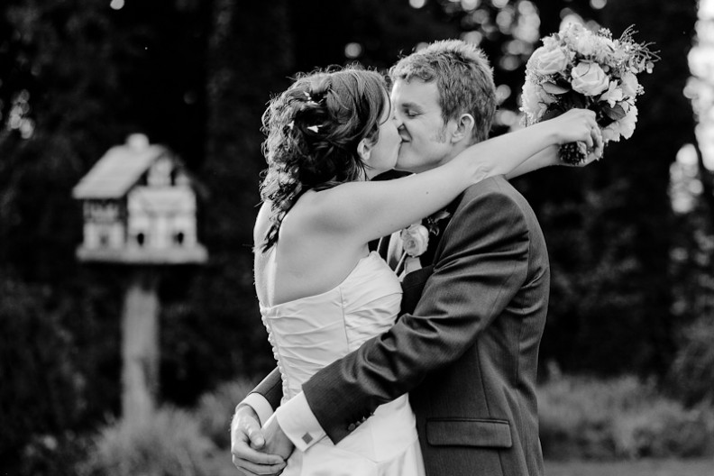 Tortworth Court Wedding Photography - Bride + Groom Kissing